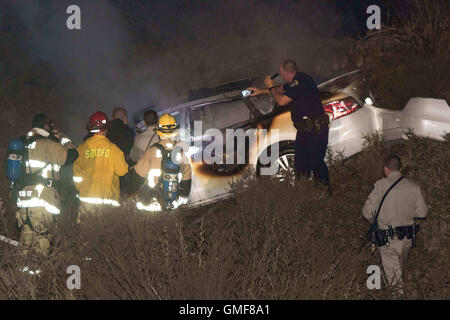 Huntington Beach, California, USA. 26th Aug, 2016. A suspect who shot a Huntington Beach Police officer during a pursuit dead after losing control of his vehicle on the Northbound 15 Freeway at Cleghorn Road around 1:30 a.m. Friday morning August 26, 2016 in San Bernardino County. Credit:  Kevin Warn/ZUMA Wire/Alamy Live News Stock Photo