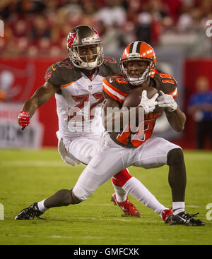 Cleveland Browns wide receiver Taylor Gabriel (18) is brought down by ...