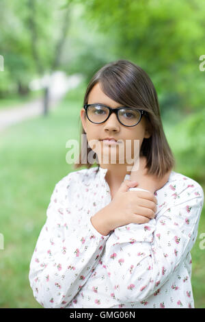 Girl in dark glasses Stock Photo