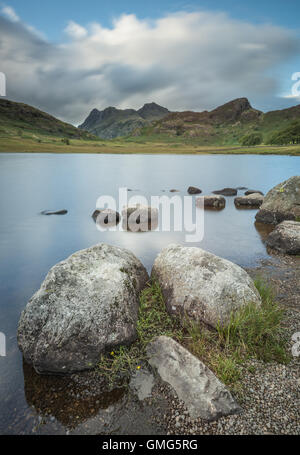 Blea Tarn, Side Pike and the Langdale Pikes, Great Langdale, English Lake District national park, England, UK Stock Photo