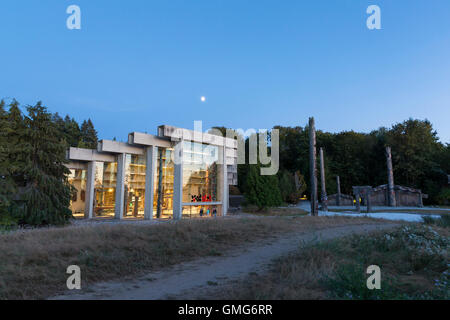 Vancouver, Canada: Moon rising over the Museum of Anthropology at the University of British Columbia. Stock Photo