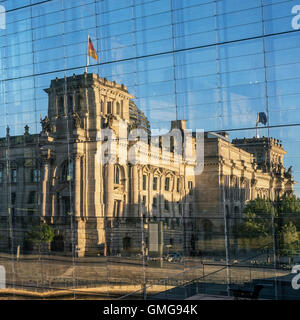 Reichstag and government buildings around river Spree in Berlin , reflection in Marie-Elisabeth-Lueders-Haus Stock Photo