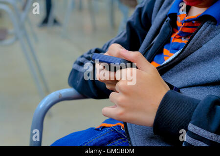 mobile phone in young man hand Stock Photo