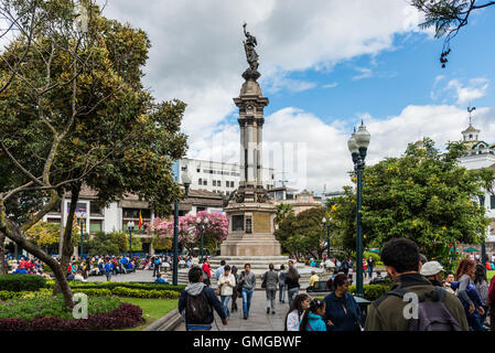 Tourists and locals gather at the Independence Square, Plaza de la Independencia, in historic old city Quito, Ecuador. Stock Photo