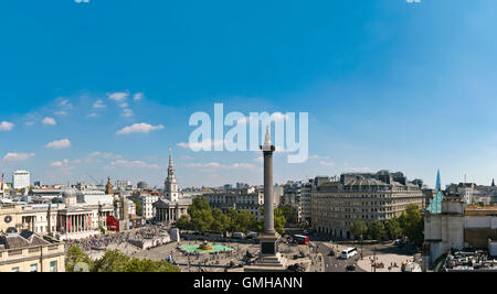 Horizontal panoramic (3 picture stitch) aerial view across Trafalgar Square in London in the sunshine. Stock Photo