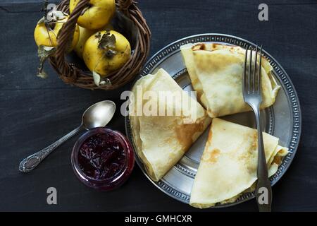 French crepes, jam and apples - sweet breakfast Stock Photo