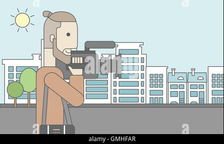 Cameraman with video camera Stock Vector