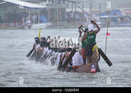 People participating in a snake boat racing known as the Nehru Trophy Boat Race held in the Punnamada Lake, Kerala,India. Stock Photo