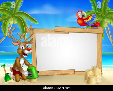 Cartoon Santa Claus and Christmas Reindeer playing on a beach making sandcastles by the beach with tropical palm trees, parrot a Stock Photo