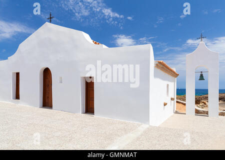 Agios Nikolaos. White Orthodox church on the Sea. Coast of island Zakynthos, Greece Stock Photo