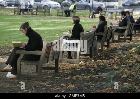 Lunchtime for ordinary mortals in Berkeley Square in affluent wealthy Mayfair Stock Photo
