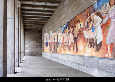 Mural by Max Lingner depicts Socialist Ideal on wall of Bundesfinanzministerium, German Ministry of Finance building. Berlin Stock Photo