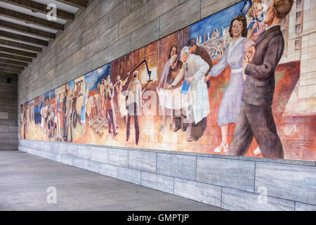 Mural by Max Lingner depicts Socialist Ideal on wall of Bundesfinanzministerium, German Ministry of Finance building. Berlin Stock Photo