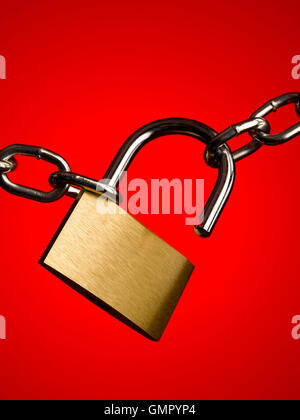 Padlock and chain on red Stock Photo