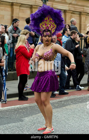 Female samba dancer taking part in the Cavalcade, part of the Edinburgh Jazz Festival. Stock Photo