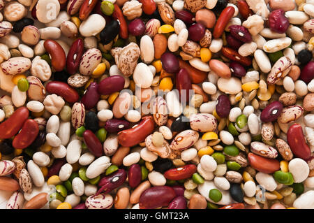 Variety of Colorful Mixed Uncooked Dry Beans Filling Frame Stock Photo