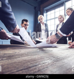 Business man getting extra work deadline concept Stock Photo