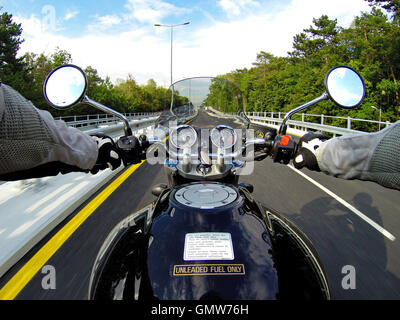 Enjoy the ride. Riding on two wheels is a very special thing for some people. Stock Photo