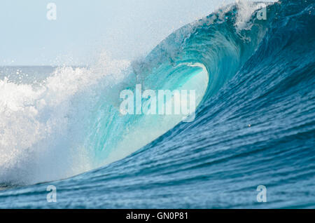 A big barrel wave break in the Pacific Ocean, perfect for surfing. Stock Photo