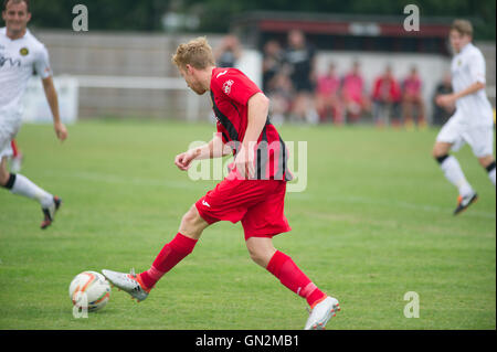 UK. 27th August, 2016. Evo-Stik Division 1 South and West; Winchester FC v Tiverton Town FC. Winchester Town's Feeney on the attack again. Credit:  Flashspix/Alamy Live News Stock Photo