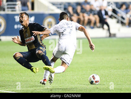 Chester, Pennsylvania, USA. 27th Aug, 2016. Sporting KC player, ROGER ESPINOZA, (27) trips Philadelphia Union's, ROLAN ALBERG (6) during match at Talen Energy Stadium in Chester Pa Credit:  Ricky Fitchett/ZUMA Wire/Alamy Live News Stock Photo