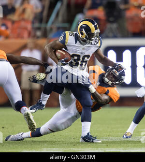 Denver, Colorado, USA. 27th Aug, 2016. Rams RB AARON GREEN gets wrapped up during the 2nd. Half at Sports Authority Field at Mile High Saturday night. The Broncos beat the Rams 17-9. © Hector Acevedo/ZUMA Wire/Alamy Live News Stock Photo