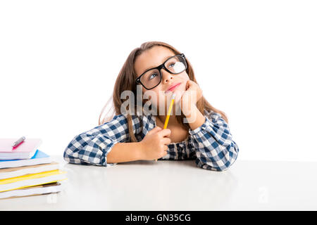 Little girl at school making drawings and painting Stock Photo