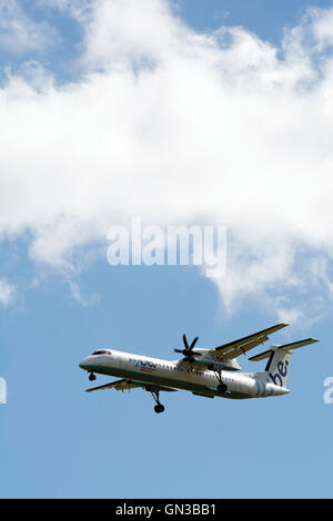 Flybe Bombardier Dash 8 approaching Birmingham Airport, UK (G-JECJ) Stock Photo