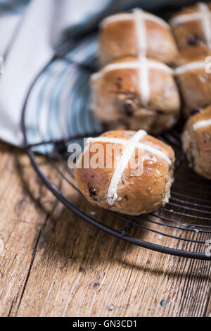 Easter hot cross buns on cooling tray Stock Photo