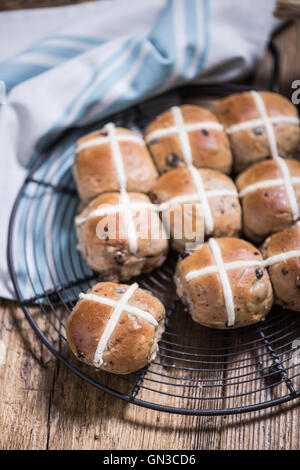 Easter hot cross buns on cooling tray Stock Photo