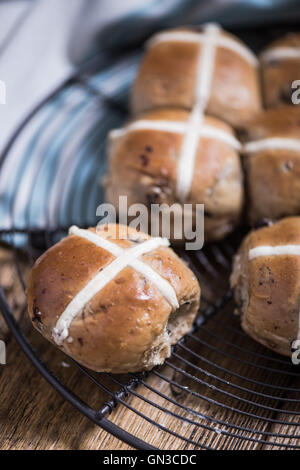 Easter hot cross buns on cooling tray Stock Photo