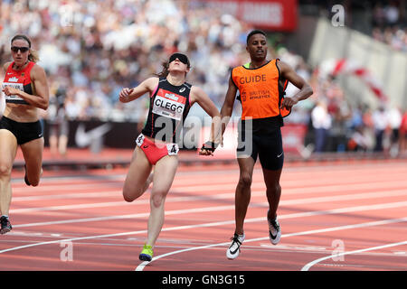 Libby CLEGG with guide Chris CLARKE crossingthe finish lines  in the Women's 200m T11/12, 2016 IPC Anniversary Games, Queen Elizabeth Olympic Park, Stratford, London, UK. Stock Photo