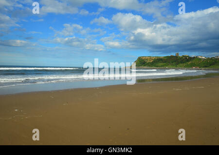 View from Scarborough beach looking towards the castle Stock Photo
