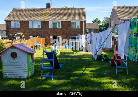 A suburban back garden on a sunny summer's evening. Stock Photo