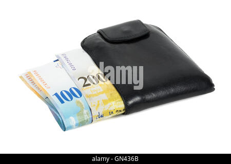 Swiss franc banknotes in black wallet isolated on white background with clipping path Stock Photo