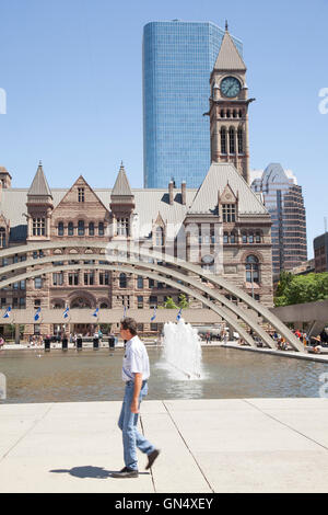 TORONTO - AUGUST 8, 2016: Toronto's Old City Hall was home to its city council from 1899 to 1966 and remains one of the city's m Stock Photo