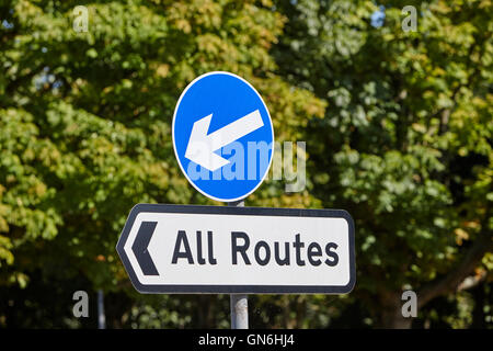 blue traffic direction arrow with all routes sign in the uk Stock Photo ...