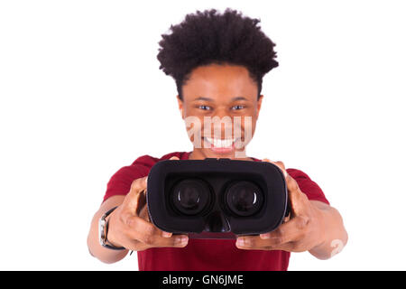 African American young man giving a vr virtual reality headset over ...