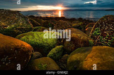 Sunset over the sea in Norway over the Arctic coast of Norway Stock Photo