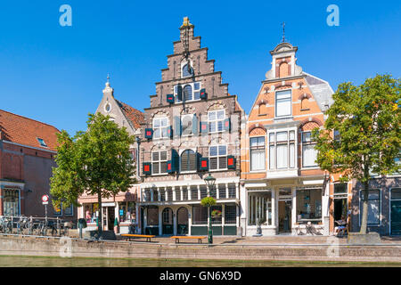 Former warehouse with stepped gable at Luttik Oudorp canal in Alkmaar, North Holland, Netherlands Stock Photo