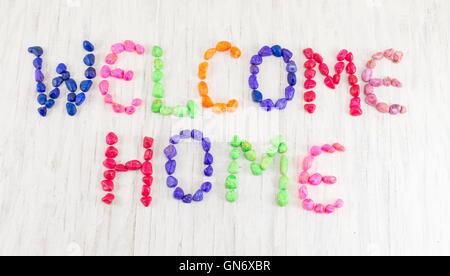 Welcome home note written with small colorful rocks Stock Photo