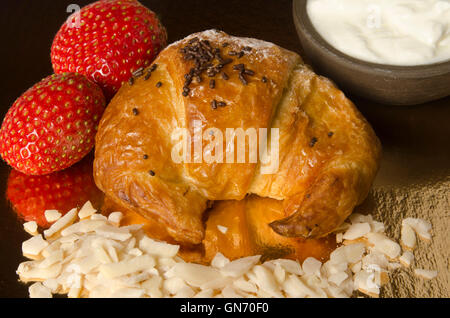 Chocolate filled croissant pastry snack Stock Photo