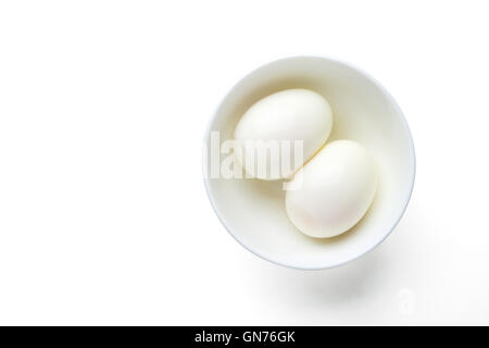 boiled eggs peeled in cup, with clipping path Stock Photo