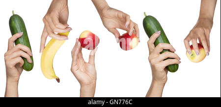 close up shot of womans hand holding fruit and veg Stock Photo