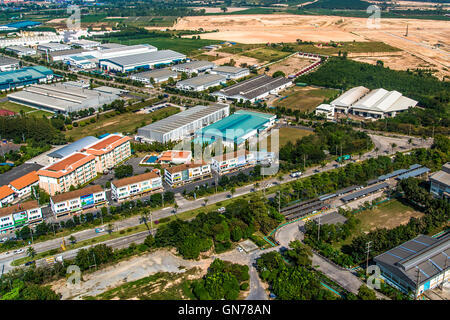 Industrial estate land development and residential area end road going through Stock Photo