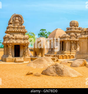 ancient Hindu monolithic Indian sculptures rock-cut architecture Pancha Rathas - Five Rathas, Mahabalipuram, Tamil Nadu, South I Stock Photo