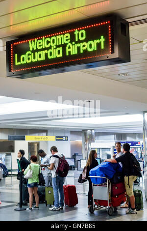 New York City,NY NYC Queens,LaGuardia Airport,LGA,domestic airport,terminal,Frontier Airlines,low-cost airline carrier,counter,check-in,Black African Stock Photo