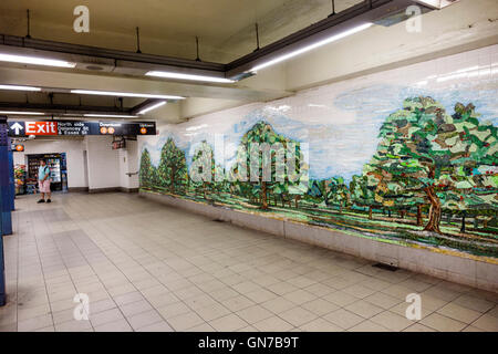 New York City,NY NYC Manhattan,MTA,Delancey Street,Essex Street,subway,station,mezzanine,mural,glass mosaic,Ming Fay,sign,exit,adult,adults,man men ma Stock Photo