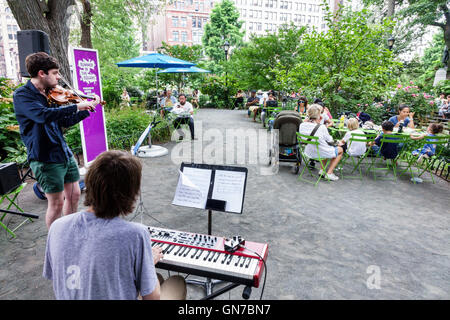 New York City,NY NYC Manhattan,Midtown,Union Square Park,public park,Summer in the Square,weekly entertainment series,activities,lunchtime concert,mus Stock Photo