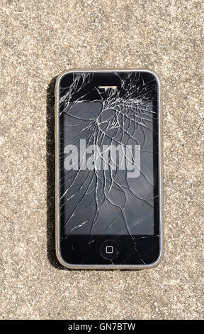 A " Blackberry smart phone " with a shattered screen Stock Photo